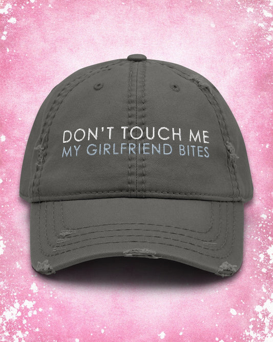 Don't Touch Me My Girlfriend Bites Distressed Dad Hat